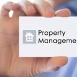 images-28-1 - Kihan Marketing Hand holding a white card displaying a small house icon and the words 'Property Management'