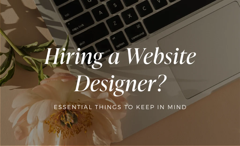 Banner image reading 'Hiring a Website Designer?' with subtitle 'Essential Things to Keep in Mind' over a laptop keyboard and pale flower.