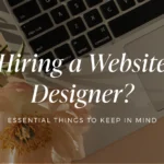 how-to-hire-website-designer - Kihan Marketing Banner image reading 'Hiring a Website Designer?' with subtitle 'Essential Things to Keep in Mind' over a laptop keyboard and pale flower.