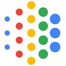 Abstract pattern of colorful dots—blue, red, yellow, and green—arranged in curved vertical columns on a white background.