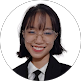 unnamed (8) - Kihan Marketing - Kihan Marketing Professional headshot of a smiling woman with glasses wearing a dark blazer and white shirt, in a circular crop.