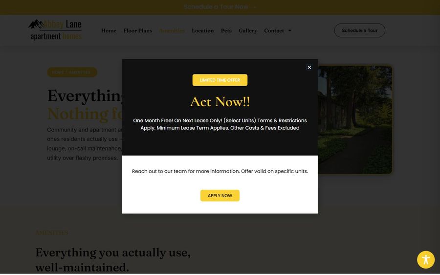 Promotional modal overlaying a property site: 'Act Now!!' limited-time offer for a free month on the next lease, with an 'APPLY NOW' button.