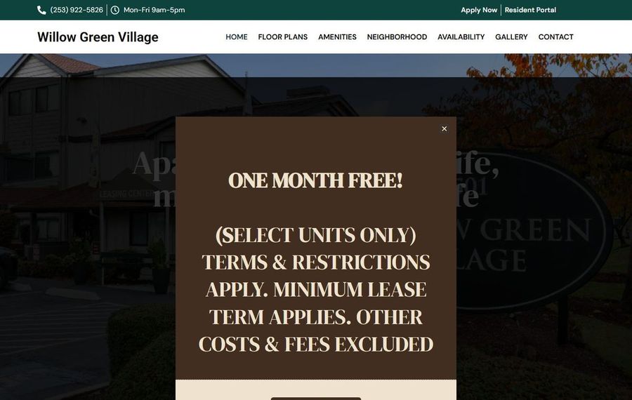 Popup ad overlay on Willow Green Village site announcing 'One Month Free' for select units; background shows the apartment complex.