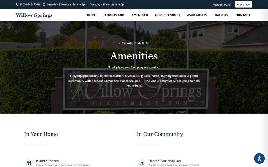 Hero banner for Willow Springs Apartments displaying the word 'Amenities' over a dark overlay with a sign in front of shrubs and homes in the background (Amenities page header).